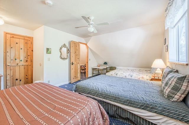 42357 Hanging Branch Rd, Shaver Lake, CA 93664 - carpeted bedroom with ceiling fan, lofted ceiling, and baseboards