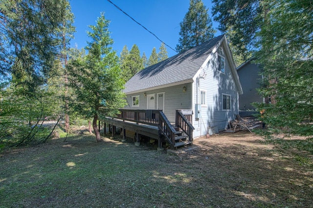42357 Hanging Branch Rd, Shaver Lake, CA 93664 - back of house featuring a wooden deck and roof with shingles