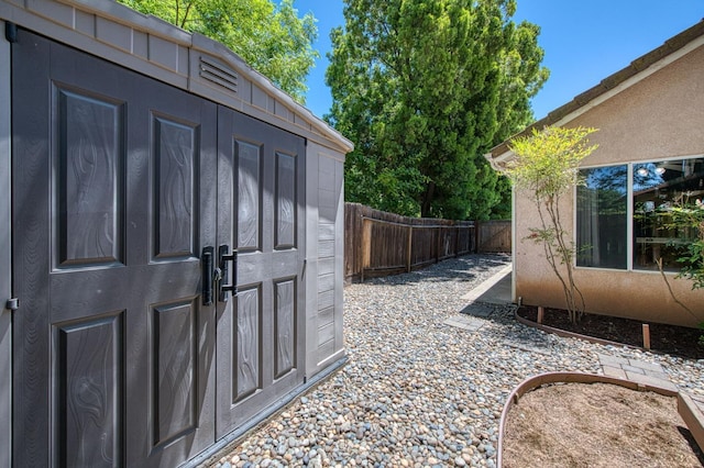7518 N Trellis Cir, Fresno, CA 93720 - fenced backyard featuring an outdoor structure