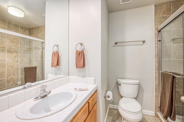 7518 N Trellis Cir, Fresno, CA 93720 - bathroom featuring vanity, toilet, a shower stall, and baseboards