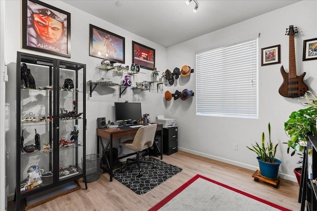 3930 Saginaw Ave, Clovis, CA 93619 - office area featuring wood finished floors and baseboards