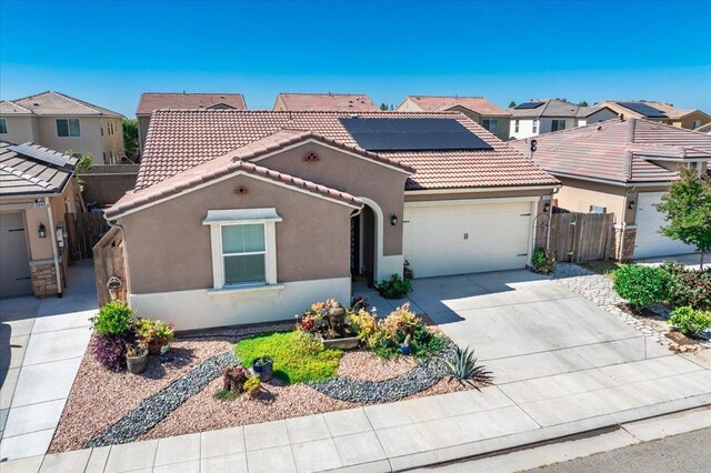 3930 Saginaw Ave, Clovis, CA 93619 - view of front facade with a garage, stucco siding, and a residential view