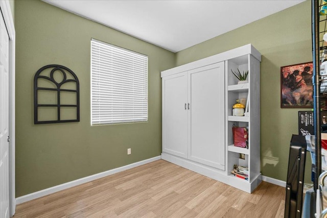 3930 Saginaw Ave, Clovis, CA 93619 - unfurnished bedroom featuring light wood finished floors and baseboards
