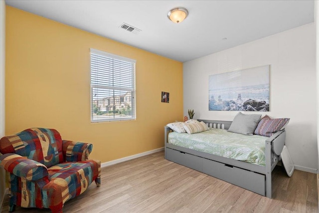 3930 Saginaw Ave, Clovis, CA 93619 - bedroom with light wood-style floors and baseboards