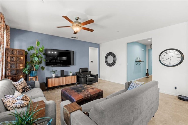 3930 Saginaw Ave, Clovis, CA 93619 - living area with ceiling fan and baseboards