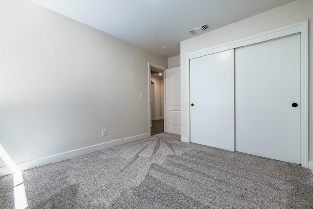 5642 W Beechwood Ave, Fresno, CA 93722 - unfurnished bedroom with carpet floors, a closet, and baseboards