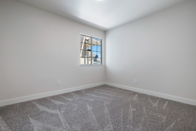 5642 W Beechwood Ave, Fresno, CA 93722 - empty room featuring baseboards and carpet flooring