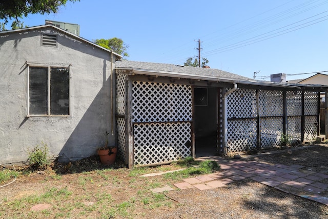 1315 W Fedora Ave, Fresno, CA 93705 - back of house featuring stucco siding