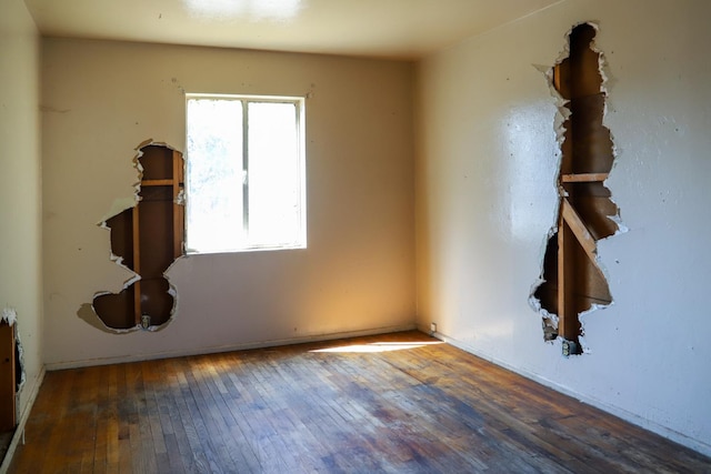 1315 W Fedora Ave, Fresno, CA 93705 - unfurnished room featuring hardwood / wood-style floors and arched walkways
