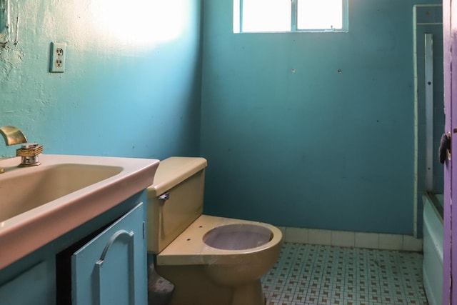 1315 W Fedora Ave, Fresno, CA 93705 - full bathroom featuring tile patterned floors and vanity