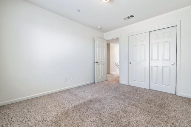 3834 Sussex Ave, Clovis, CA 93619 - unfurnished bedroom with carpet flooring, baseboards, and a closet