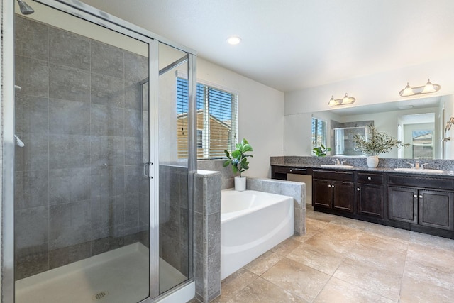 3834 Sussex Ave, Clovis, CA 93619 - bathroom featuring double vanity, a bath, a shower stall, and recessed lighting