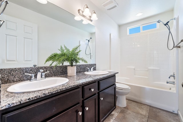 3834 Sussex Ave, Clovis, CA 93619 - bathroom with toilet, bathtub / shower combination, and double vanity