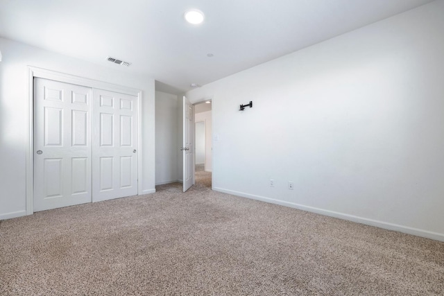 3834 Sussex Ave, Clovis, CA 93619 - unfurnished bedroom with light carpet, baseboards, and a closet