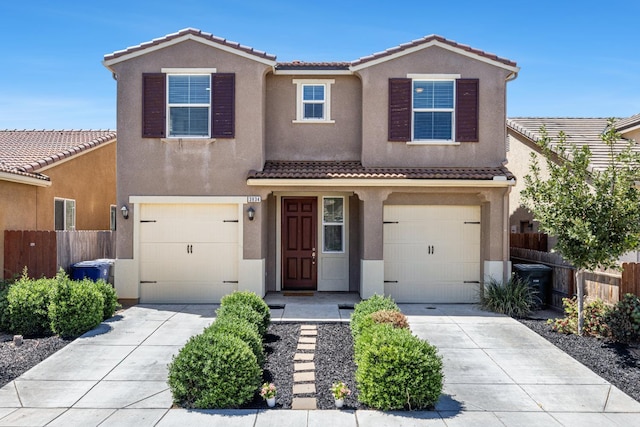 3834 Sussex Ave, Clovis, CA 93619 - traditional home featuring a tile roof, concrete driveway, an attached garage, and stucco siding