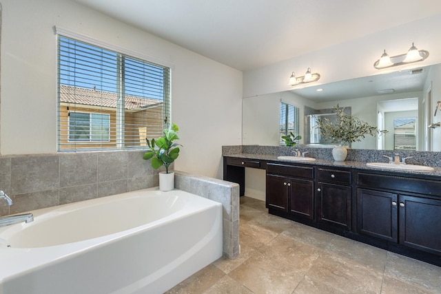 3834 Sussex Ave, Clovis, CA 93619 - full bathroom with double vanity and a garden tub