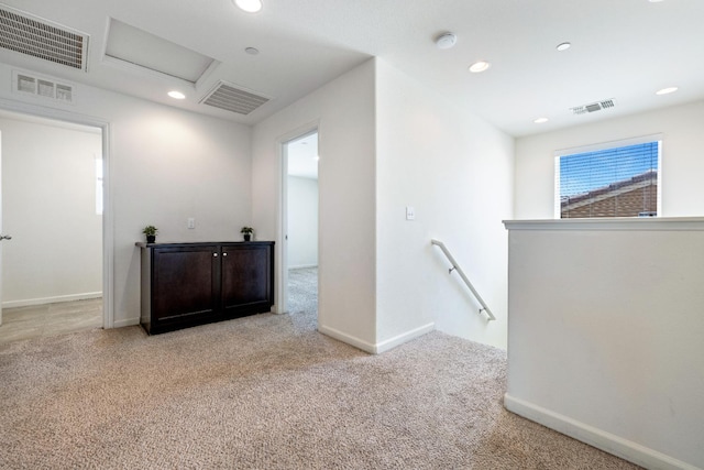 3834 Sussex Ave, Clovis, CA 93619 - hallway with an upstairs landing, attic access, light colored carpet, recessed lighting, and baseboards