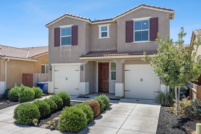 3834 Sussex Ave, Clovis, CA 93619 - traditional-style house with a tile roof, stucco siding, concrete driveway, and a garage