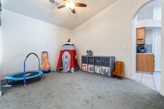 2903 Desert Ranch Way, Madera, CA 93637 - recreation room featuring arched walkways, a ceiling fan, lofted ceiling, carpet flooring, and baseboards