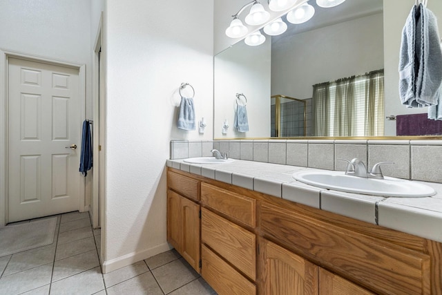 2903 Desert Ranch Way, Madera, CA 93637 - bathroom with double vanity, a shower with curtain, and tile patterned floors