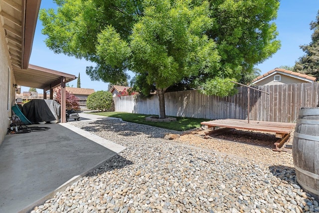 2903 Desert Ranch Way, Madera, CA 93637 - fenced backyard with a patio area