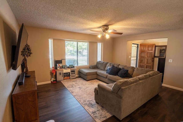 1603 E Serena Ave, Fresno, CA 93720 - living room with a ceiling fan, dark wood-type flooring, baseboards, and a textured ceiling