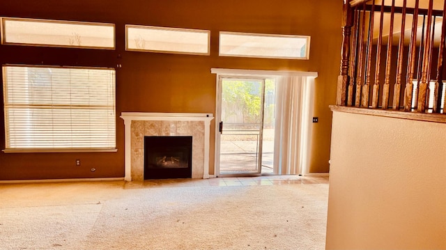 5346 W Flint Way, Fresno, CA 93722 - unfurnished living room featuring carpet and a fireplace