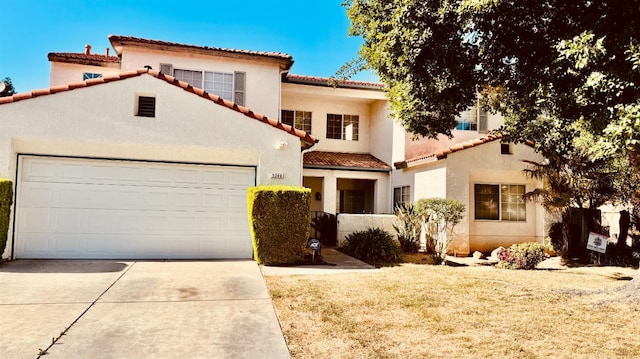 5346 W Flint Way, Fresno, CA 93722 - mediterranean / spanish-style house with a tiled roof, concrete driveway, a garage, and stucco siding