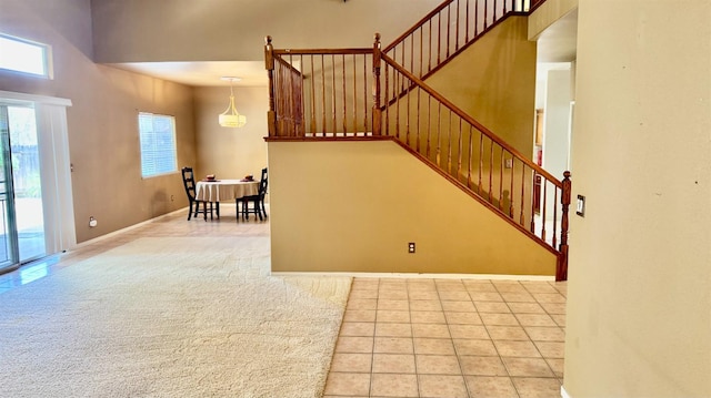 5346 W Flint Way, Fresno, CA 93722 - stairs featuring tile patterned floors and baseboards
