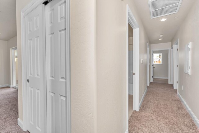 43 E Florence Ave, Fresno, CA 93706 - corridor with light carpet, baseboards, and recessed lighting