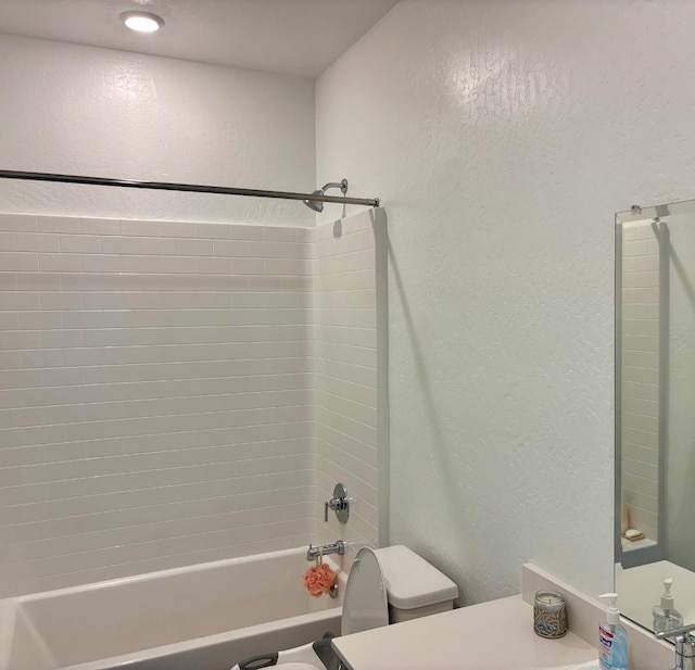6423 E Robinson, Fresno, CA 93727 - full bath with a textured wall, toilet, shower / bath combination, and vanity