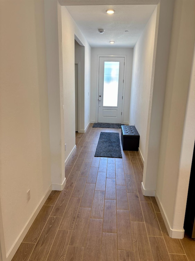 6423 E Robinson, Fresno, CA 93727 - doorway to outside with wood finished floors and baseboards