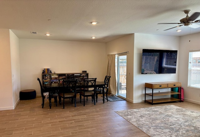 6423 E Robinson, Fresno, CA 93727 - dining space featuring wood finished floors, ceiling fan, baseboards, recessed lighting, and a textured ceiling