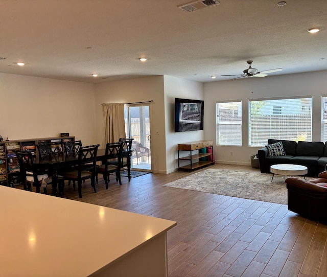 6423 E Robinson, Fresno, CA 93727 - living area with a ceiling fan, wood finished floors, baseboards, and recessed lighting