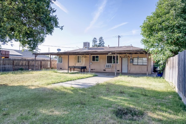 1205 W Clinton Ave, Fresno, CA 93705 - rear view of house with stucco siding, central AC, a patio area, and ceiling fan