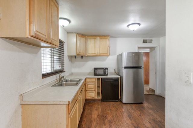 1205 W Clinton Ave, Fresno, CA 93705 - kitchen featuring light brown cabinetry, black appliances, a sink, light countertops, and dark wood-style flooring