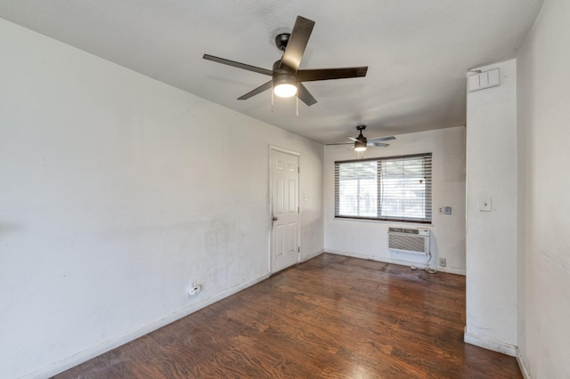 1205 W Clinton Ave, Fresno, CA 93705 - unfurnished room featuring a wall unit AC, a ceiling fan, wood finished floors, and baseboards