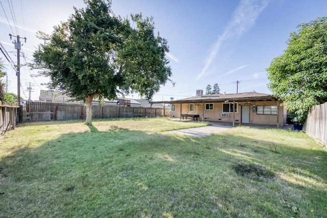 1205 W Clinton Ave, Fresno, CA 93705 - view of yard with a patio