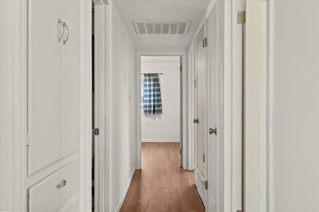 4003 E Fedora Ave, Fresno, CA 93726 - corridor featuring dark wood-type flooring and baseboards