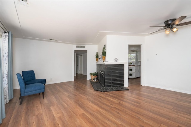4003 E Fedora Ave, Fresno, CA 93726 - sitting room with wood finished floors and ceiling fan