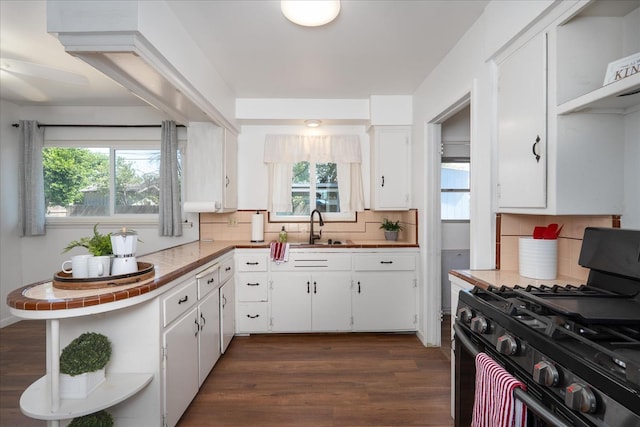 4003 E Fedora Ave, Fresno, CA 93726 - kitchen featuring range with gas stovetop, white cabinetry, backsplash, and open shelves