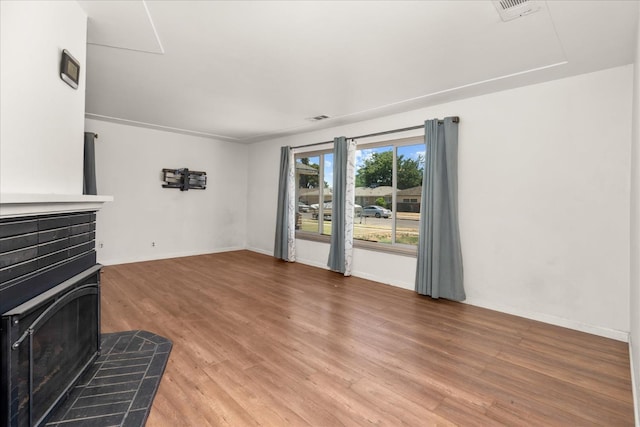 4003 E Fedora Ave, Fresno, CA 93726 - unfurnished living room with light wood-type flooring and baseboards