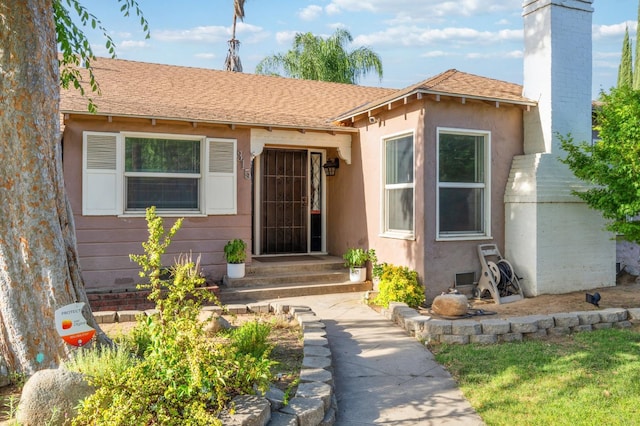 315 E Clinton Ave, Fresno, CA 93704 - entrance to property with stucco siding