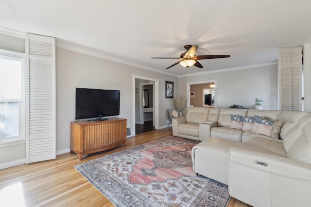 315 E Clinton Ave, Fresno, CA 93704 - living room with baseboards, light wood-type flooring, ceiling fan, and ornamental molding