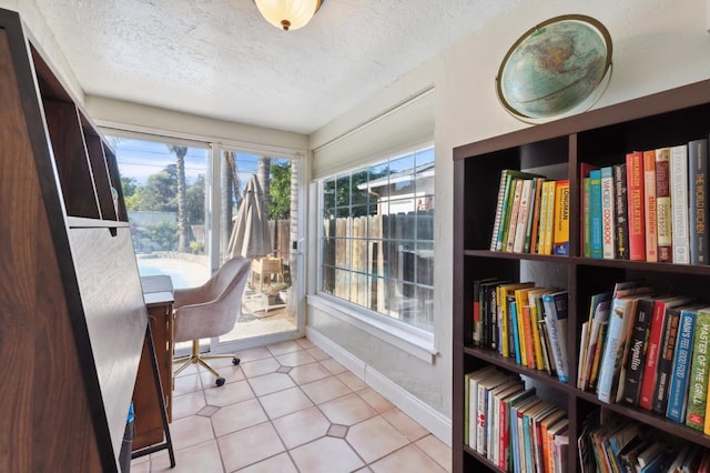 315 E Clinton Ave, Fresno, CA 93704 - office area with a textured ceiling and baseboards