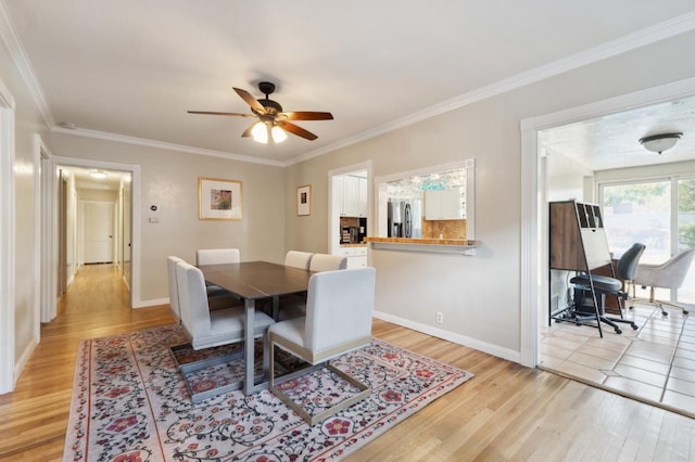 315 E Clinton Ave, Fresno, CA 93704 - dining room featuring light wood-style flooring, ornamental molding, baseboards, and ceiling fan
