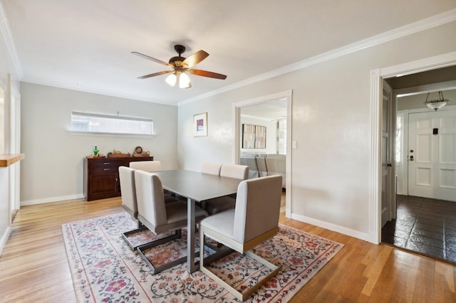 315 E Clinton Ave, Fresno, CA 93704 - dining area featuring light wood-type flooring, ceiling fan, crown molding, and baseboards