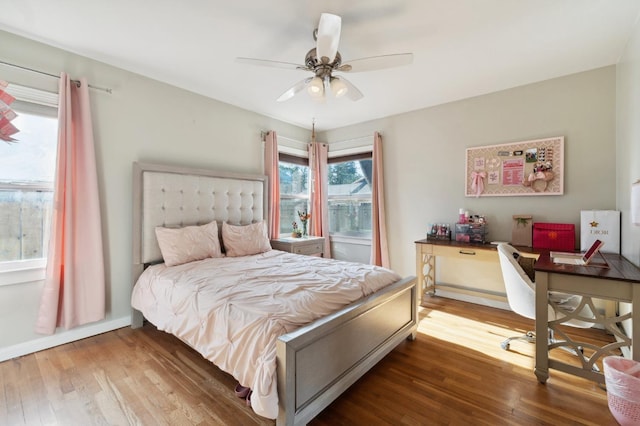 315 E Clinton Ave, Fresno, CA 93704 - bedroom with wood finished floors, an office area, and a ceiling fan