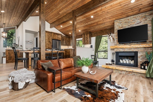 41831 Saddleback Rd, Shaver Lake, CA 93664 - living area with light wood finished floors, wooden ceiling, recessed lighting, and a fireplace
