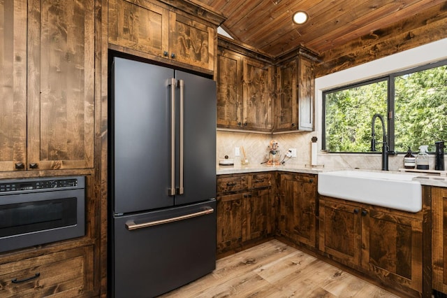 41831 Saddleback Rd, Shaver Lake, CA 93664 - kitchen featuring stainless steel appliances, wood ceiling, a sink, light wood-type flooring, and lofted ceiling